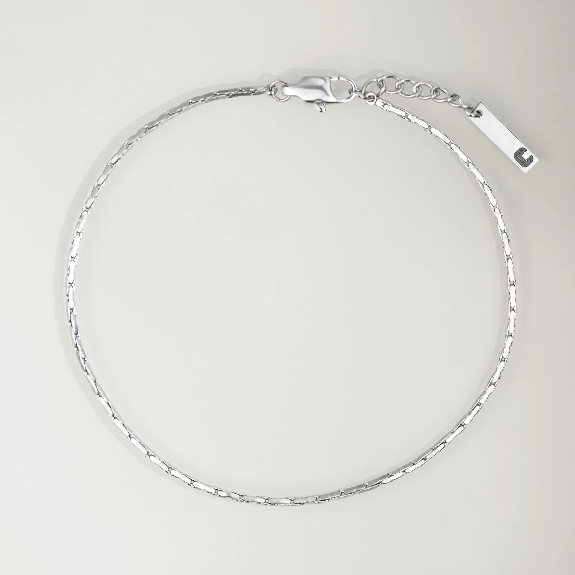 Bracelet Forma, maille forçat limée, argenté